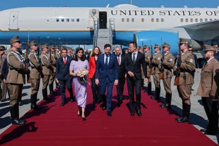 Hungarian Foreign Minister Peter Szijjarto welcomes U.S. Vice President JD Vance and second lady Usha Vance as they arrive in Budapest
